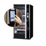 De Vendo G-Drink 6 Touch DT6 is een moderne drankautomaat met touchscreen, geschikt voor blikjes en flessen. Ideaal voor locaties waar gebruiksgemak, presentatie en een strak design samenkomen.