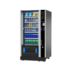 Extra informatie over de Vendo G Snack 8 Design SC8 De Vendo G Snack 8 Design SC8 is ontwikkeld voor locaties waar uitstraling en functionaliteit hand in hand gaan. Deze automaat biedt een moderne en elegante look, waardoor hij perfect past in omgevingen zoals kantoren, hotels en andere professionele ruimtes. Wat deze automaat uniek maakt, is de combinatie van design en flexibiliteit. Dankzij de slimme indeling kun je een breed assortiment aanbieden, van snacks en gekoelde dranken tot andere producten in verschillende vormen en maten. De SC8 is daarnaast ontworpen met een splitfunctie, waardoor de automaat eenvoudiger te plaatsen is op locaties met smalle doorgangen. Dit maakt hem extra praktisch bij installatie zonder in te leveren op capaciteit. Met maximaal 56 selecties heb je voldoende ruimte om jouw aanbod volledig af te stemmen op de locatie en doelgroep. Hierdoor kun je eenvoudig inspelen op verschillende behoeften en verkoopkansen. De betrouwbare koeltechniek zorgt ervoor dat producten altijd op de juiste temperatuur blijven, wat essentieel is voor kwaliteit en verkoop. De G Snack Design serie staat bekend om zijn hoogwaardige afwerking en sterke prestaties. De SC8 is daarin de perfecte middenweg: stijlvol, flexibel en geschikt voor vrijwel iedere professionele omgeving.
