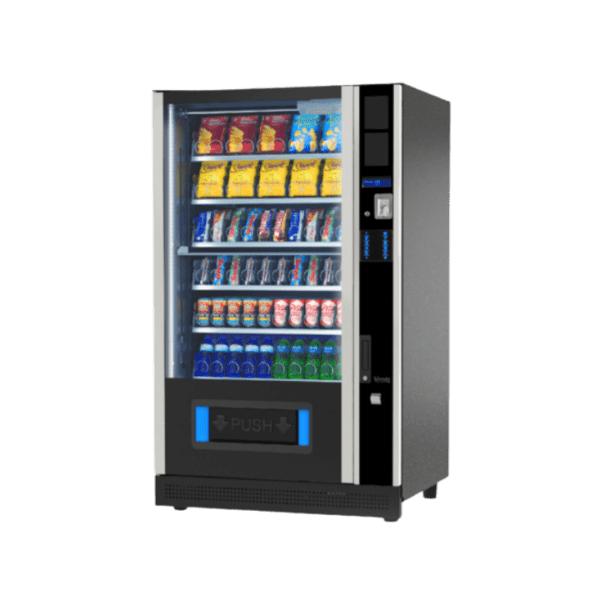 Extra informatie over de Vendo G Snack 10 Design SDX De Vendo G Snack 10 Design SDX is ontwikkeld voor locaties waar uitstraling en beleving net zo belangrijk zijn als functionaliteit. Denk aan kantoren, hotels of andere professionele omgevingen waar een standaard vendingmachine simpelweg niet volstaat. Wat deze automaat onderscheidt, is het strakke en moderne design. Hierdoor past hij moeiteloos in hoogwaardige interieurs en wordt hij eerder gezien als onderdeel van de ruimte dan als losse automaat. Ideaal als je vending wilt inzetten als volwaardig verkoop- of servicepunt. Met ruimte voor maximaal 70 selecties biedt deze automaat enorm veel flexibiliteit. Je kunt een breed assortiment samenstellen van snacks, gekoelde dranken en verse producten, maar ook non food items zoals accessoires of verzorgingsproducten behoren tot de mogelijkheden. De G Snack Design serie staat daarnaast bekend om zijn veelzijdigheid in productformaten. Hierdoor kun je eenvoudig inspelen op verschillende doelgroepen en concepten, van standaard vending tot een uitgebreid retailaanbod. Net als bij de andere Vendo modellen ben je verzekerd van betrouwbare koeltechniek en stabiele prestaties. Producten blijven altijd op de juiste temperatuur, wat essentieel is voor kwaliteit en verkoop. De SDX is daarmee de perfecte combinatie van capaciteit, uitstraling en flexibiliteit. Een echte eyecatcher die tegelijkertijd zorgt voor maximale omzetmogelijkheden.
