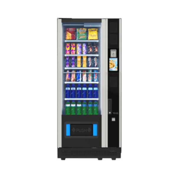 Extra informatie over de Vendo G Snack 6 Touch ST6 De Vendo G Snack 6 Touch ST6 is ontwikkeld voor locaties waar ruimte beperkt is, maar waar je toch een moderne en professionele vendingoplossing wilt inzetten. Dankzij het compacte formaat is deze automaat eenvoudig te plaatsen op plekken waar grotere machines niet passen. Het geïntegreerde touchscreen zorgt voor een intuïtieve en gebruiksvriendelijke bediening. Klanten kunnen eenvoudig hun producten selecteren, wat zorgt voor een snelle en prettige aankoopervaring. De automaat is geschikt voor een breed assortiment, waaronder snacks, frisdranken en non food producten. Met maximaal 36 selecties kun je een efficiënt en goed afgestemd aanbod samenstellen. Dankzij de robuuste bouw is de ST6 bestand tegen intensief gebruik en geschikt voor drukbezochte locaties. Dit maakt hem een betrouwbare keuze voor onder andere kantoren, sportlocaties en openbare ruimtes. Het FiFo systeem maakt het bijvullen eenvoudig en efficiënt, wat zorgt voor beter voorraadbeheer en minder verspilling. Optioneel kan de automaat worden uitgerust met extra functionaliteiten zoals een productlift of ID scanner, waardoor je ook kwetsbare producten of leeftijdsgebonden artikelen veilig kunt verkopen. De ST6 is daarmee een slimme keuze voor wie een compacte, moderne en betrouwbare vendingmachine zoekt met maximale gebruiksvriendelijkheid.